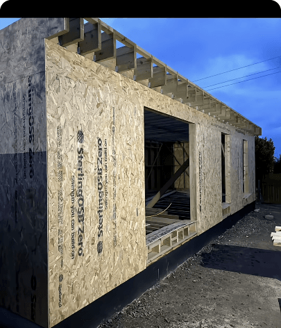 Timber-frame annex shell at dusk under construction — TikTok video thumbnail with 1,048 views