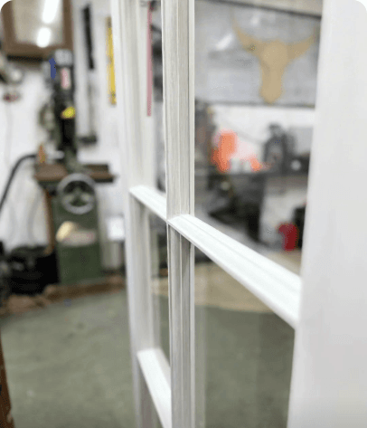 Close-up of a white-painted sash window detail in the workshop — TikTok video thumbnail with 6,457 views